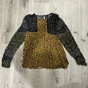 Anthropologie contrasting animal print blouse